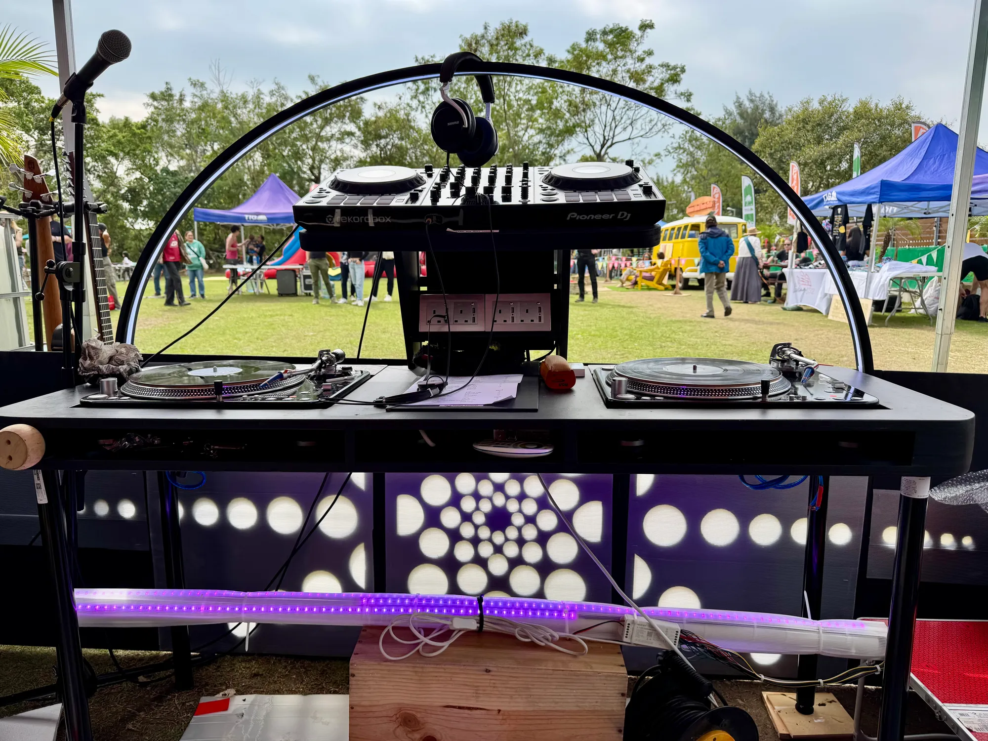 Turntables and lights set up in the VIBE Alive DJ tent